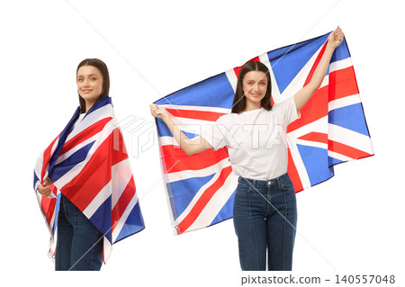 Woman joyfully embraces the British flag, showcasing her love for travel and adventure, on white Woman joyfully embraces the British flag, showcasing her love for travel and adventure, on white 140557048