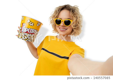 Woman holds large popcorn bucket and smiles at camera, PNG Woman holds large popcorn bucket and smiles at camera, PNG 140557085
