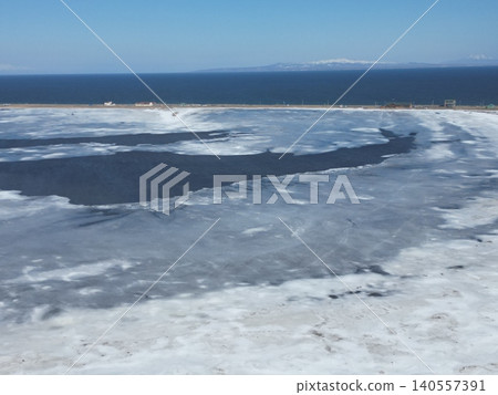 Aerial view of the ice plains of Notsuke Bay in Betsukai Town, Hokkaido. Aerial view of the ice plains of Notsuke Bay in Betsukai Town, Hokkaido. 140557391