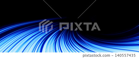A futuristic abstract technology background with flowing lines of glowing blue light. A futuristic abstract technology background with flowing lines of glowing blue light. 140557435