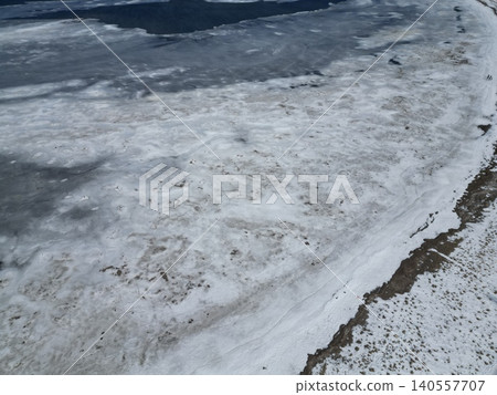 Aerial view of the winter scenery of the ice plains on the Notsuke Peninsula in Betsukai Town, Hokkaido. Aerial view of the winter scenery of the ice plains on the Notsuke Peninsula in Betsukai Town, Hokkaido. 140557707
