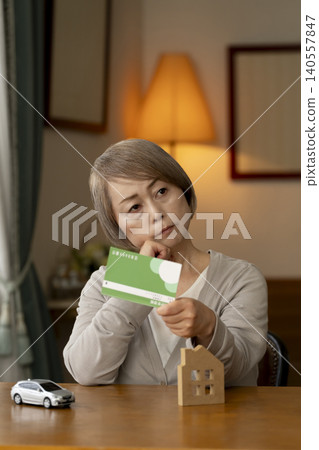 Senior women are worried about their retirement funds due to rising interest rates. Senior women are worried about their retirement funds due to rising interest rates. 140557847