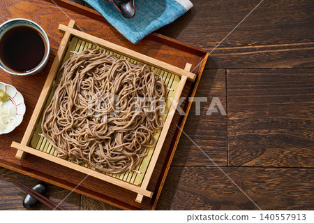 Mori Soba: Cold soba noodles served in a bamboo steamer with dipping sauce. Mori Soba: Cold soba noodles served in a bamboo steamer with dipping sauce. 140557913