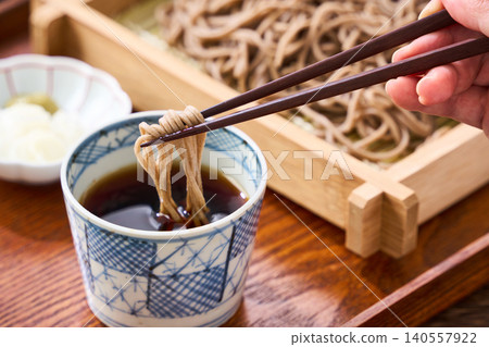 Mori Soba: Cold soba noodles served in a bamboo steamer with dipping sauce. Mori Soba: Cold soba noodles served in a bamboo steamer with dipping sauce. 140557922