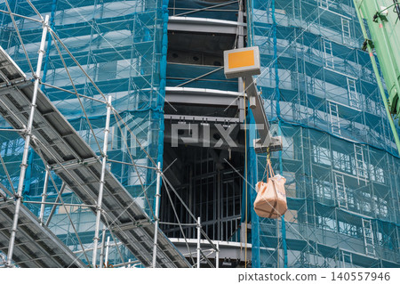 Loading and unloading waste materials from construction sites. Loading and unloading waste materials from construction sites. 140557946