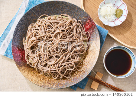 Mori Soba: Cold soba noodles served on a Japanese plate with dipping sauce. Mori Soba: Cold soba noodles served on a Japanese plate with dipping sauce. 140560101