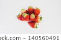 Macro photography of strawberries, white background, copy space, fresh fruit material. 140560491