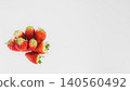 Macro photography of strawberries, white background, copy space, fresh fruit material. 140560492
