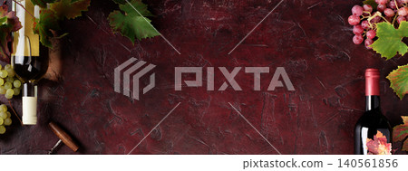 Red Wine Bottles and Glass with Grapevine on Rustic Background Red Wine Bottles and Glass with Grapevine on Rustic Background 140561856