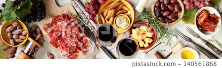 Wine and Charcuterie Board with Cheese Olives and Snacks Wine and Charcuterie Board with Cheese Olives and Snacks 140561868