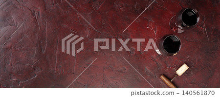 Red Wine Glasses with Cork on Dark Rustic Background Red Wine Glasses with Cork on Dark Rustic Background 140561870