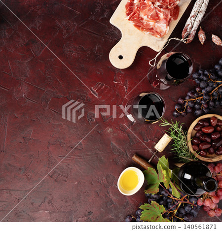 Wine and Charcuterie Corner on Dark Rustic Background 140561871