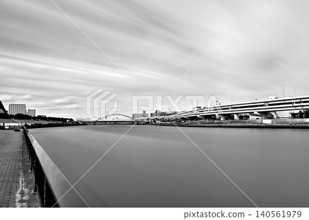 A monochrome view of the Suijin Ohashi Bridge over the Sumida River in Tokyo. A monochrome view of the Suijin Ohashi Bridge over the Sumida River in Tokyo. 140561979
