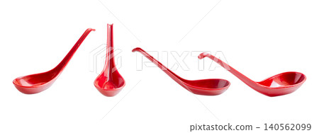 A set of four vibrant red ceramic Asian-style soup spoons arranged in different angles against a plain white background, ideal for culinary photography or food-related projects A set of four vibrant red ceramic Asian-style soup spoons arranged in different angles against a plain white background, ideal for culinary photography or food-related projects 140562099