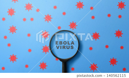 A conceptual image showing the words Ebola Virus viewed through a magnifying glass, surrounded by red virus icons on a blue background, representing medical research and disease investigation A conceptual image showing the words Ebola Virus viewed through a magnifying glass, surrounded by red virus icons on a blue background, representing medical research and disease investigation 140562115