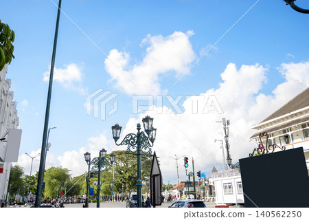 Iconic ornate street lamps in Yogyakarta, Indonesia, under a bright blue sky Iconic ornate street lamps in Yogyakarta, Indonesia, under a bright blue sky 140562250
