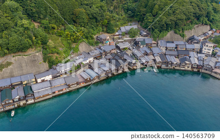 The boathouses of Ine nestled in the forest The boathouses of Ine nestled in the forest 140563709