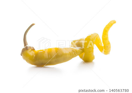 Pickled Banana Peppers and Pepperoncini Close-Up on White Background for Salad and Condiment Use Pickled Banana Peppers and Pepperoncini Close-Up on White Background for Salad and Condiment Use 140563780