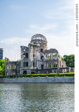 A cityscape along the river overlooking Hiroshima Peace Memorial Park and the Atomic Bomb Dome. A cityscape along the river overlooking Hiroshima Peace Memorial Park and the Atomic Bomb Dome. 140564045