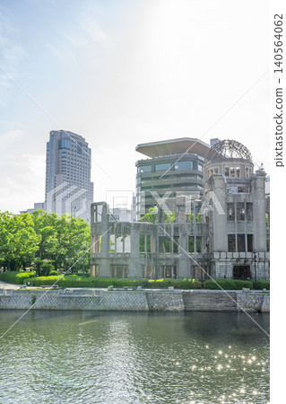 A cityscape along the river overlooking Hiroshima Peace Memorial Park and the Atomic Bomb Dome. A cityscape along the river overlooking Hiroshima Peace Memorial Park and the Atomic Bomb Dome. 140564062