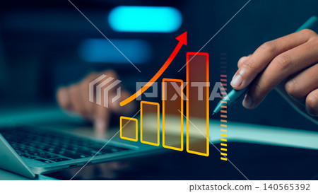 Professional business person hands using stylus and laptop with digital hologram of growing bar chart and upward arrow. Concept of financial success, sales growth, market investment and data analysis. Professional business person hands using stylus and laptop with digital hologram of growing bar chart and upward arrow. Concept of financial success, sales growth, market investment and data analysis. 140565392
