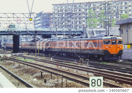 Japanese National Railways (JNR) era Tokaido Line 113 series, including Kuha 111-539, at Hiranumabashi Station on the Sotetsu Line, May 5, 1980. Japanese National Railways (JNR) era Tokaido Line 113 series, including Kuha 111-539, at Hiranumabashi Station on the Sotetsu Line, May 5, 1980. 140565667