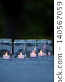 Candlelight in a glass bottle 140567059
