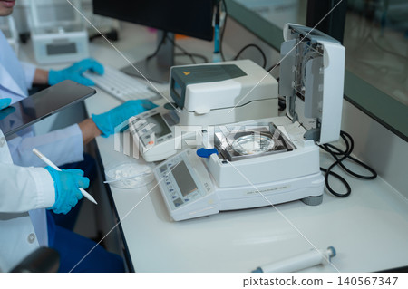 Chemist scientist or doctor working in research laboratory, medical analysis, documents, scientific study. Chemist scientist or doctor working in research laboratory, medical analysis, documents, scientific study. 140567347