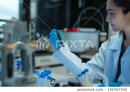Life scientists researching in a modern lab,  biotech innovation, medical analysis, DNA research, and healthcare science in a clean. 140567348