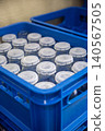 A container case filled with milk bottles 140567505