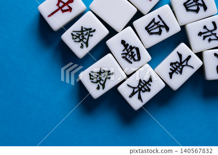 mahjong tiles lined up 140567832