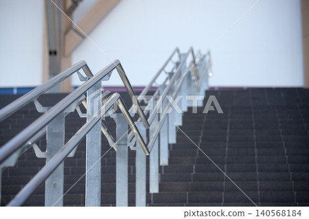 Staircases and barrier-free handrails in commercial facilities in Japanese cities. Staircases and barrier-free handrails in commercial facilities in Japanese cities. 140568184