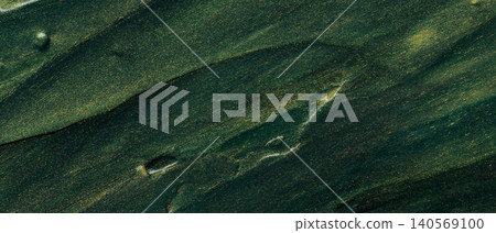 Abstract dark green oil paint texture with golden shimmer and diagonal brushstrokes on canvas Abstract dark green oil paint texture with golden shimmer and diagonal brushstrokes on canvas 140569100