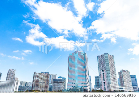 A landscape lined with tower apartments and skyscrapers. A landscape lined with tower apartments and skyscrapers. 140569930
