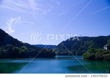 Dam lake and blue sky Dam lake and blue sky 140570010