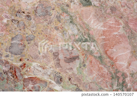 Close view of colorful marble stone showing natural patterns and textures in a unique arrangement 140570107