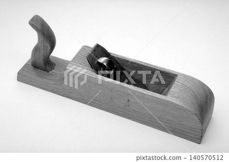 a Traditional Wooden Hand Plane tool isolated on a white background a Traditional Wooden Hand Plane tool isolated on a white background 140570512