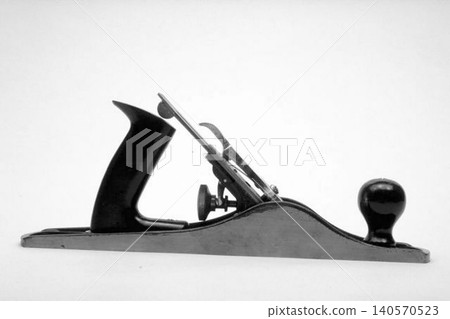 A realistic image of a Handheld Wood Plane isolated on a white background 140570523