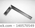 A realistic image of a Steel Carpenter's Square with Measurement Markings 140570549