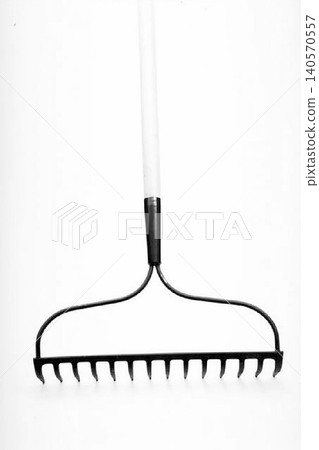 A realistic image of a Garden Rake isolated on a white background A realistic image of a Garden Rake isolated on a white background 140570557