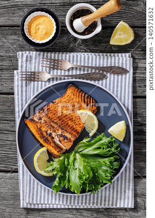 BBQ salmon fish on plate with fresh salad BBQ salmon fish on plate with fresh salad 140571632