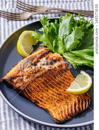 BBQ salmon fish on plate with fresh salad BBQ salmon fish on plate with fresh salad 140571638