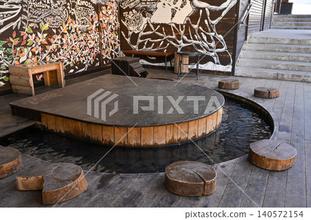 A relaxing and healing space to unwind in a footbath at a hot spring resort. A relaxing and healing space to unwind in a footbath at a hot spring resort. 140572154