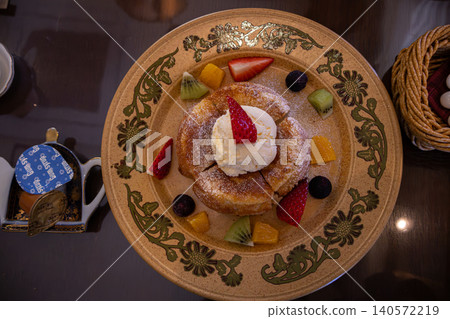 French toast and fruit dessert plate from a cafe French toast and fruit dessert plate from a cafe 140572219