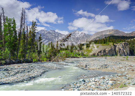 Snowmelt rivers flowing through the Kluane Mountains and taiga forests of Kluane National Park Snowmelt rivers flowing through the Kluane Mountains and taiga forests of Kluane National Park 140572322