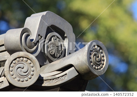Roof tiles bearing the Aoi family crest; roof tiles of a samurai residence. Roof tiles bearing the Aoi family crest; roof tiles of a samurai residence. 140572352
