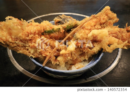 Big conger eel tempura bowl, specialty dish, huge bowl of tempura bowl Big conger eel tempura bowl, specialty dish, huge bowl of tempura bowl 140572354