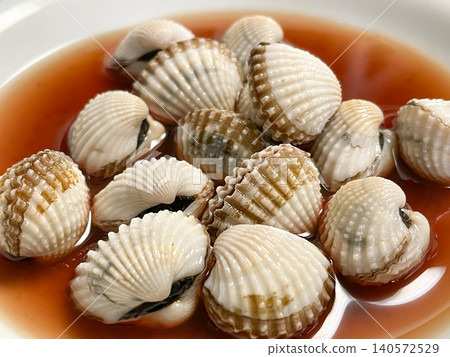 Chinese Ningbo cuisine: Drunken Clams (Clams marinated in Shaoxing wine) Chinese Ningbo cuisine: Drunken Clams (Clams marinated in Shaoxing wine) 140572529