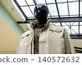 Male mannequin dressed in elegant jacket in shopping mall 140572632