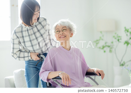 Grandchild and senior woman Grandchild and senior woman 140572730